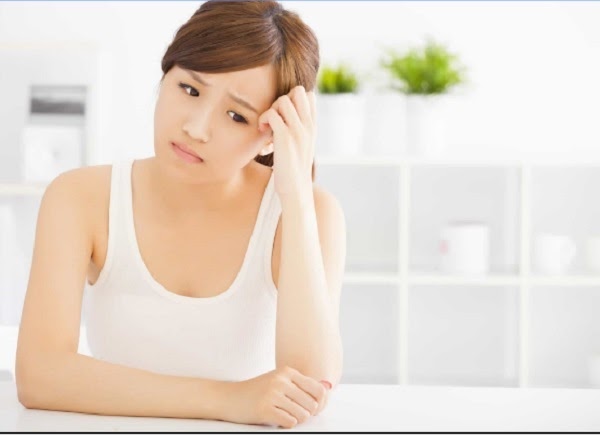 chậm kinh đau bụng dưới đau lưng