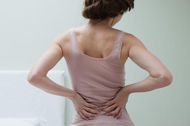 Mỏi lưng có phải là dấu hiệu có thai không