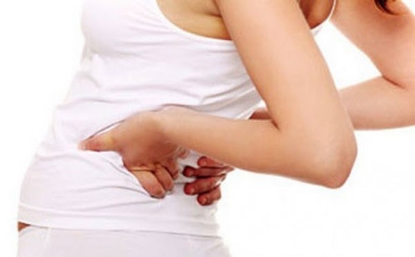 mỏi lưng có phải là dấu hiệu có thai không